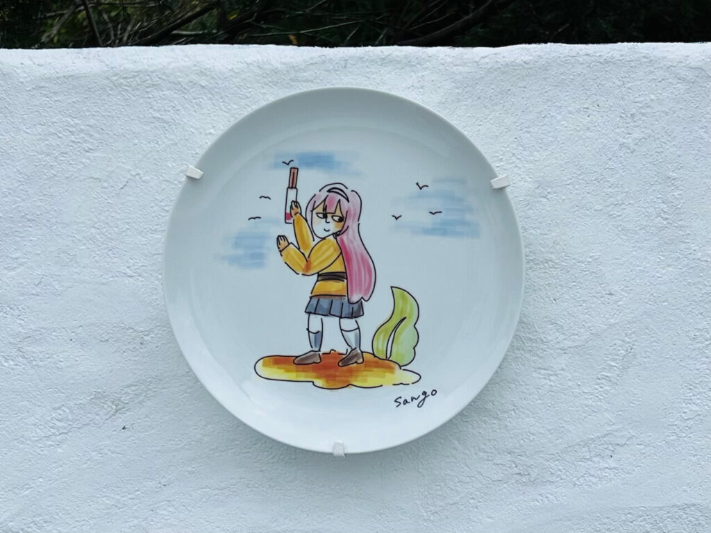 志摩スペイン村のサロメンゴ村コラボのお皿ラリーのお皿（見返りサンゴhave tasty churros）